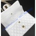 Chanel Small Classic Flap Bag in White Lambskin with golden hardware