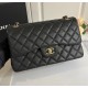 Chanel Jumbo Classic Flap Bag in Black Caviar Leather with golden hardware