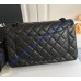 Chanel Jumbo Classic Flap Bag in Black Lambskin with black hardware