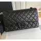 Chanel Jumbo Classic Flap Bag in Black Lambskin with black hardware