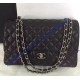Chanel Small Classic Flap Bag in Black Lambskin with silver hardware