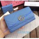 Gucci GG Marmont continental wallet in Blue leather with a chevron design