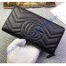 Gucci GG Marmont zip around wallet in Black leather with a chevron design