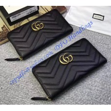 Gucci GG Marmont zip around wallet in Black leather with a chevron design Gucci GG Marmont zip around wallet in Black leather with a chevron design