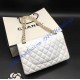 Chanel Small Classic Flap Bag in White Lambskin with golden hardware