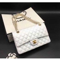 Chanel Small Classic Flap Bag in White Lambskin with golden hardware