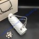 Chanel Small Classic Flap Bag in White Lambskin with silver hardware