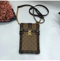 Louis Vuitton Monogram Reverse Canvas Vertical Trunk Pochette M67873