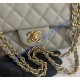 Chanel Small Classic Flap Bag in Gray Caviar Leather with golden hardware