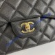 Chanel Jumbo Classic Flap Bag in Black Caviar Leather with golden hardware