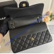 Chanel Jumbo Classic Flap Bag in Black Caviar Leather with golden hardware