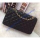 Chanel Small Classic Flap Bag in Black Lambskin with golden hardware