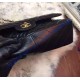 Chanel Jumbo Classic Flap Bag in Black Lambskin with golden hardware