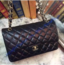 Chanel Jumbo Classic Flap Bag in Black Lambskin with golden hardware