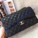 Chanel Jumbo Classic Flap Bag in Black Lambskin with silver hardware