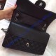 Chanel Jumbo Classic Flap Bag in Black Lambskin with silver hardware