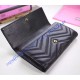 Gucci GG Marmont continental wallet in Black leather with a chevron design