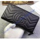 Gucci GG Marmont zip around wallet in Black leather with a chevron design