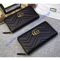 Gucci GG Marmont zip around wallet in Black leather with a chevron design