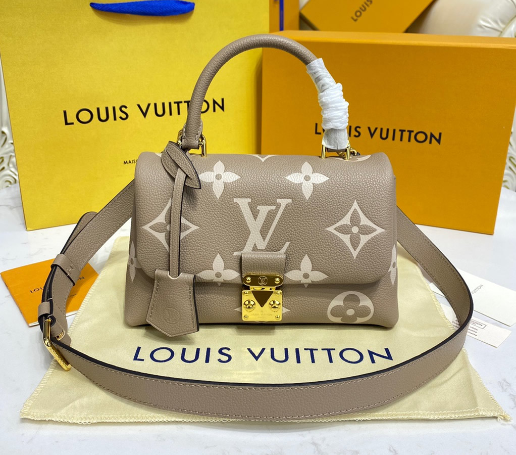 Louis Vuitton Bicolor Monogram Empreinte Leather Madeleine BB M45978